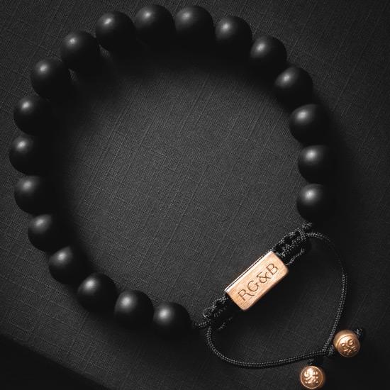 Matte Black Bracelet - Our Matte Black Bead Bracelet Features Natural Stones, Waxed Cord and Brushed Rose Gold Steel Hardware. A Beautiful Addition to any Collection.